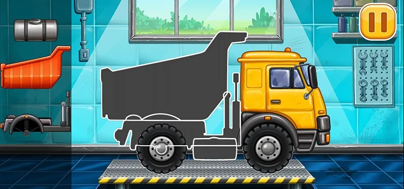 Bé tự tay lắp ráp chiếc xe tải của mình